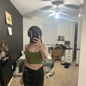 green workout top with built in bra